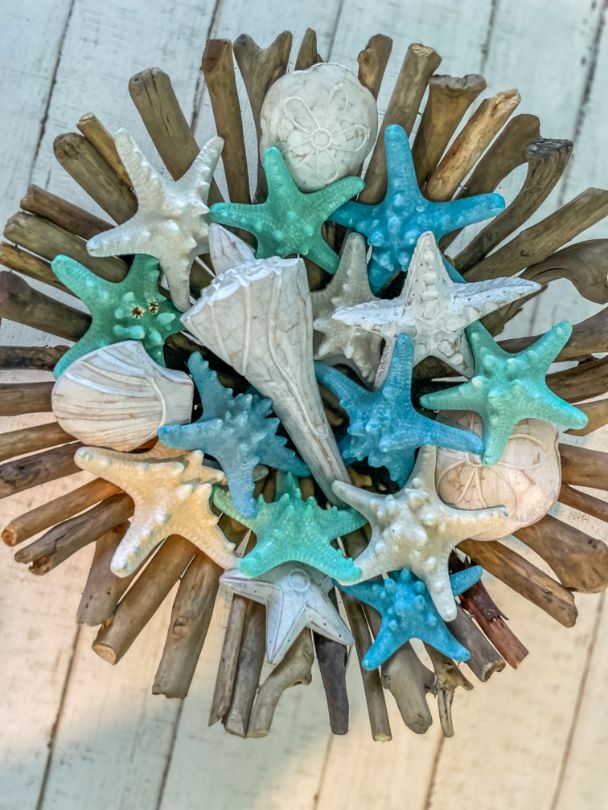 Seashells and Starfishes in a Wooden Bowl